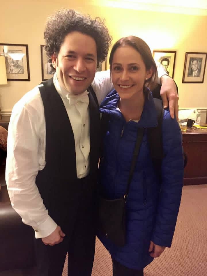 Erina Goldwasser with conductor Gustavo Dudamel backstage